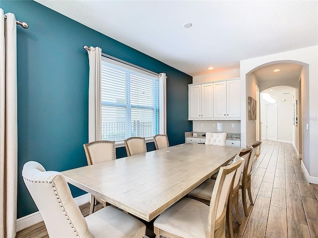 dining space with light wood-type flooring