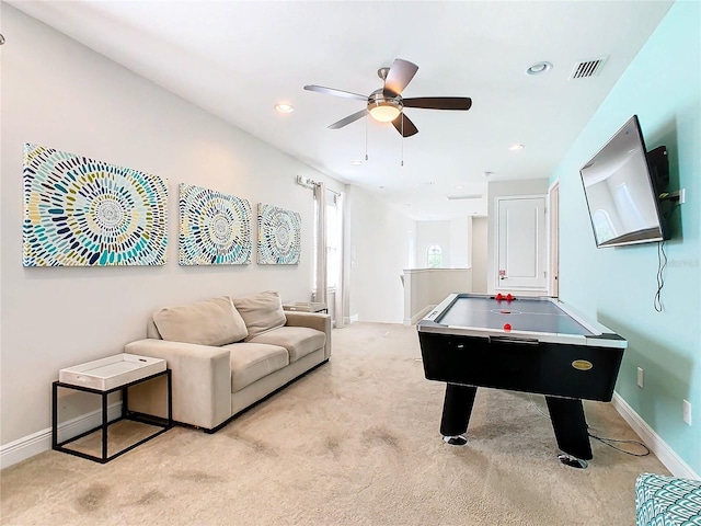 playroom with light colored carpet and ceiling fan