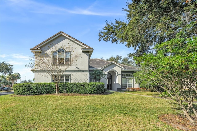 view of front of home with a front lawn