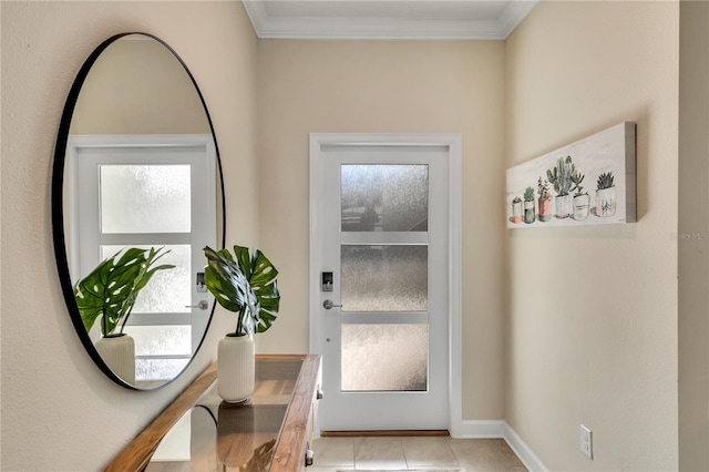 doorway to outside with plenty of natural light, crown molding, and light tile floors