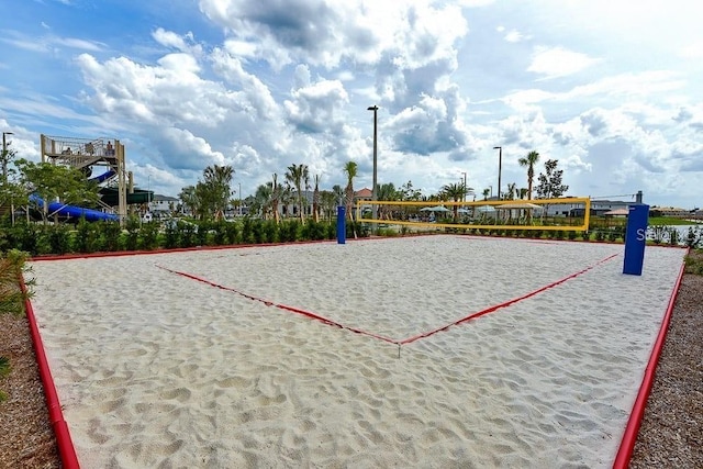 view of home's community featuring volleyball court