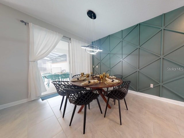 view of tiled dining space