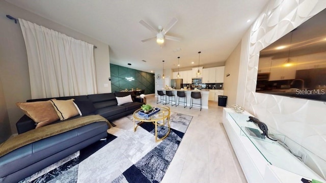 living room featuring ceiling fan