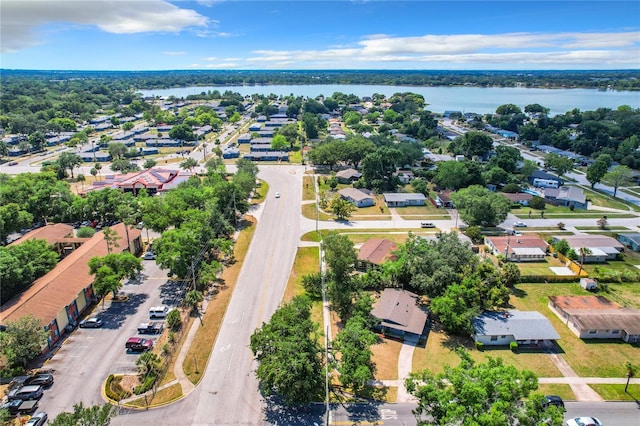 bird's eye view with a water view and a residential view