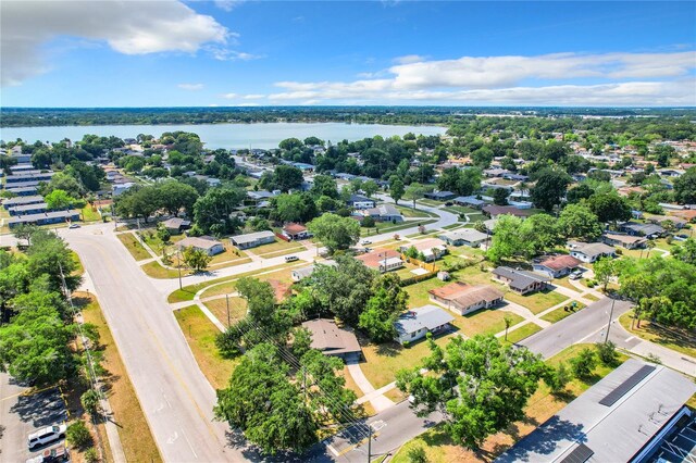 aerial view with a water view and a residential view