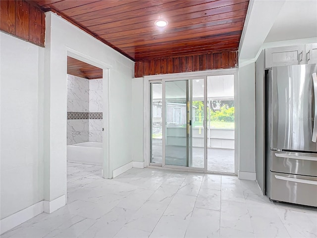 tiled empty room with wooden ceiling