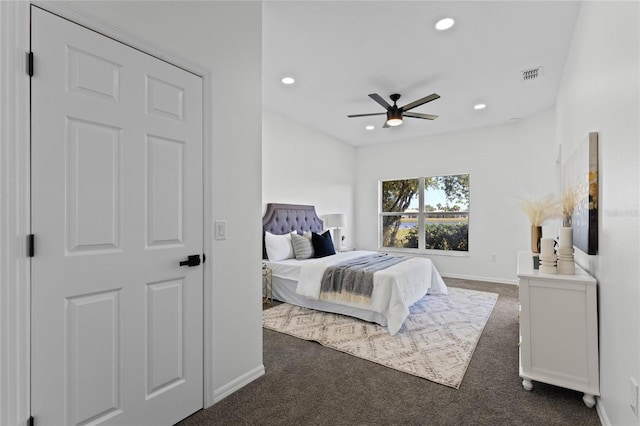 carpeted bedroom with ceiling fan