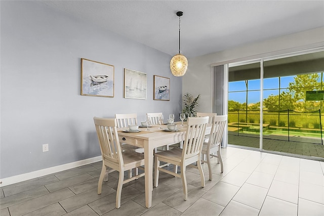 dining room featuring tile floors