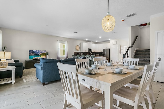 view of tiled dining space