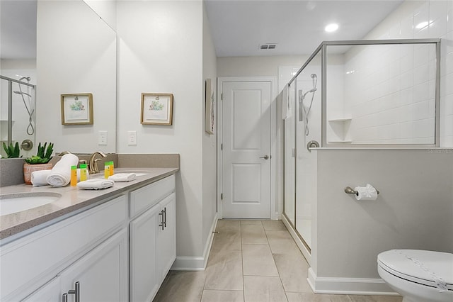 bathroom featuring walk in shower, toilet, tile flooring, and dual vanity