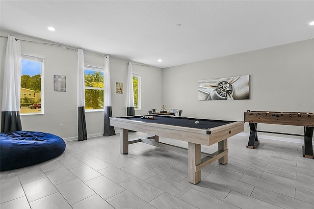 playroom featuring a healthy amount of sunlight, light tile floors, and billiards