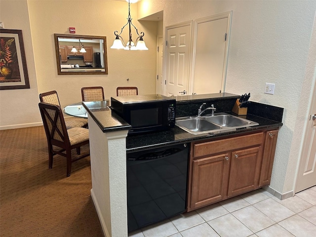 kitchen with decorative light fixtures, black appliances, a chandelier, light tile floors, and sink