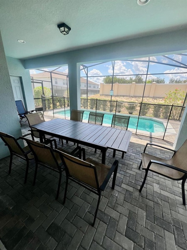 unfurnished sunroom with plenty of natural light