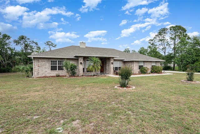 single story home featuring a front yard