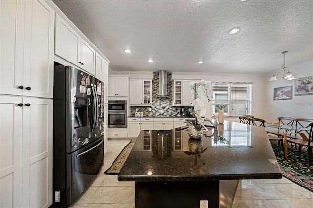 kitchen with tasteful backsplash, light tile flooring, black refrigerator with ice dispenser, wall chimney exhaust hood, and stainless steel double oven