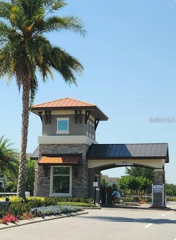 exterior space featuring a carport