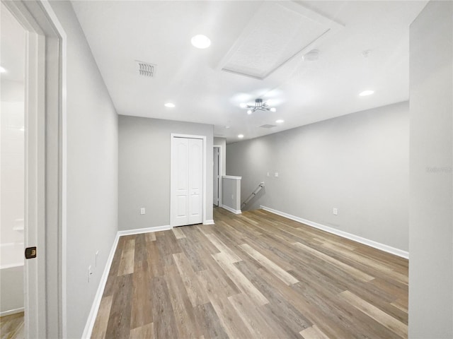 spare room with light wood-type flooring