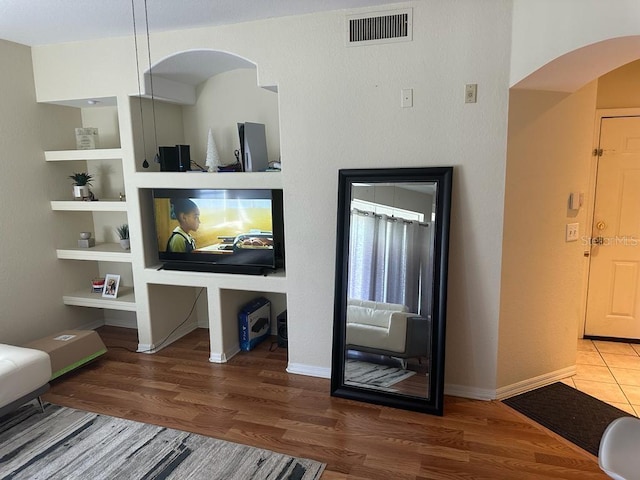 living room featuring tile floors