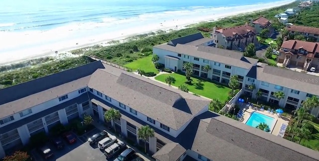 bird's eye view with a view of the beach and a water view