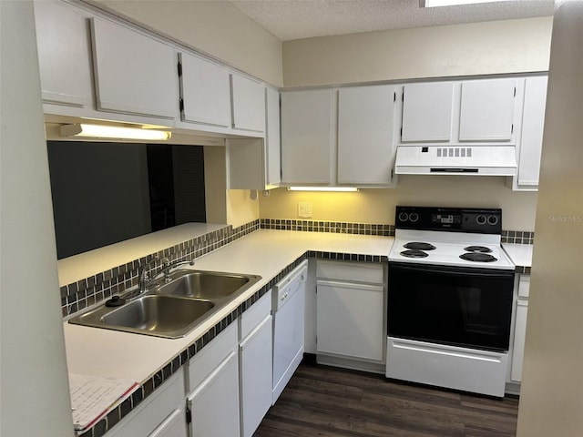 kitchen featuring white cabinets, dark hardwood / wood-style floors, white appliances, and ventilation hood