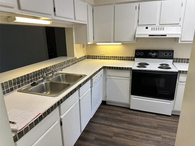 kitchen featuring dark hardwood / wood-style floors, white appliances, sink, and white cabinetry