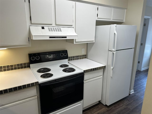 kitchen featuring premium range hood, tile countertops, white appliances, and dark hardwood / wood-style flooring