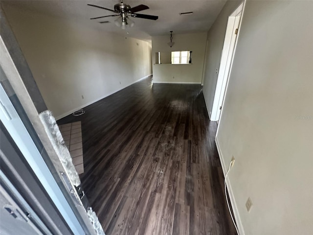 spare room with ceiling fan and hardwood / wood-style flooring