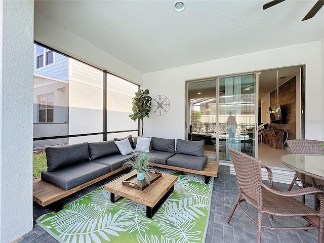 living room with ceiling fan