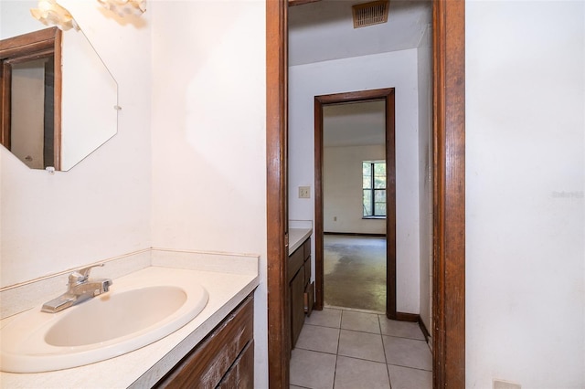 bathroom featuring vanity and tile patterned flooring