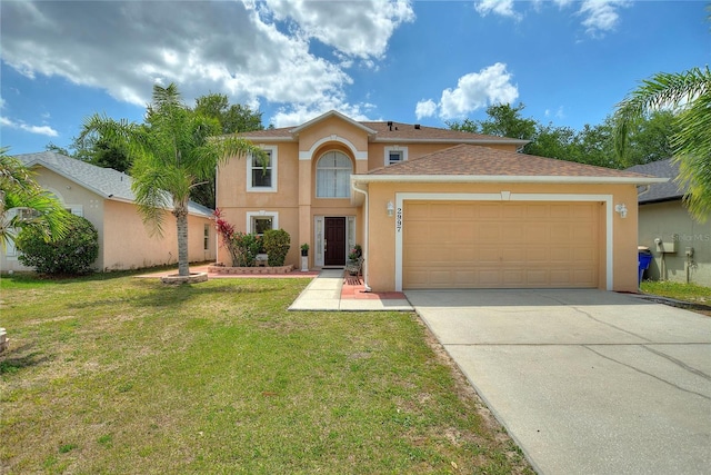 view of front of property featuring a garage and a front lawn