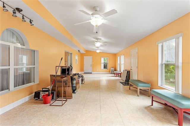 interior space featuring ceiling fan and track lighting