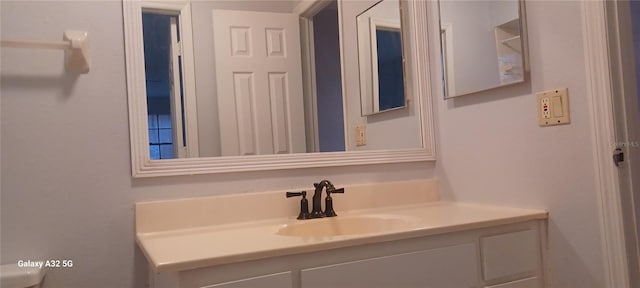 bathroom with vanity with extensive cabinet space