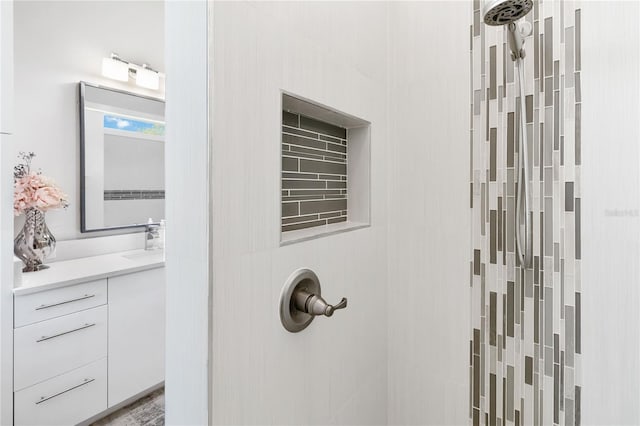 bathroom with a shower and oversized vanity