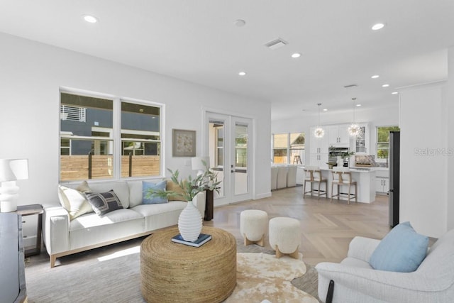 living room with light parquet flooring