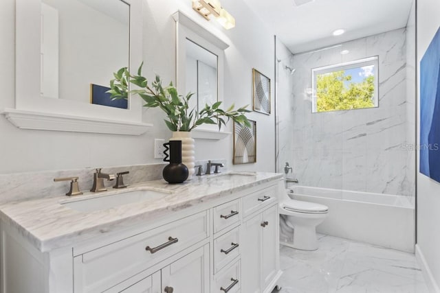 full bathroom with vanity with extensive cabinet space, toilet, tile flooring, tiled shower / bath, and double sink