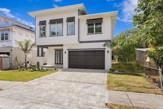 view of front of home featuring a garage