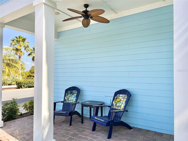 view of patio featuring ceiling fan