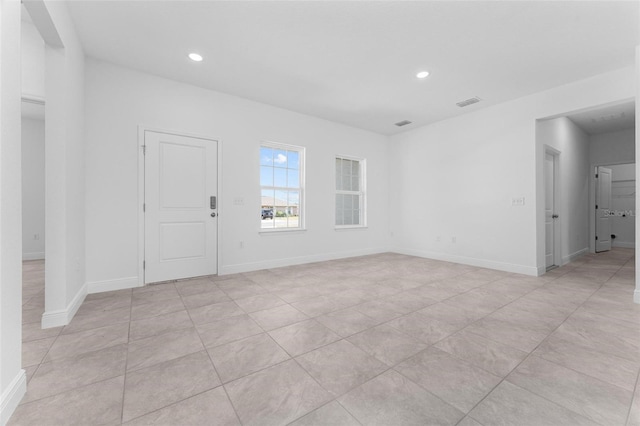 foyer with light tile floors