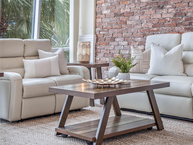 living room with brick wall