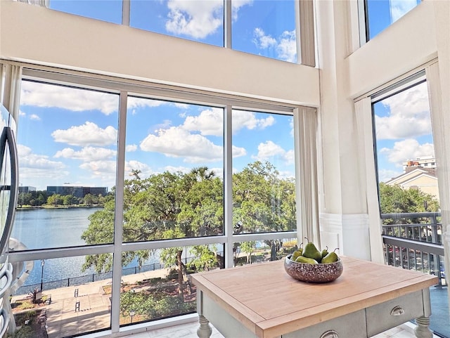 sunroom with a water view