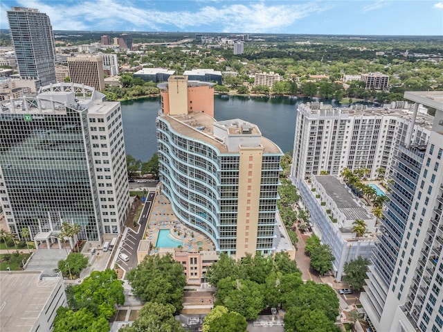 birds eye view of property with a water view