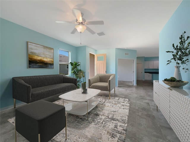 tiled living room featuring ceiling fan