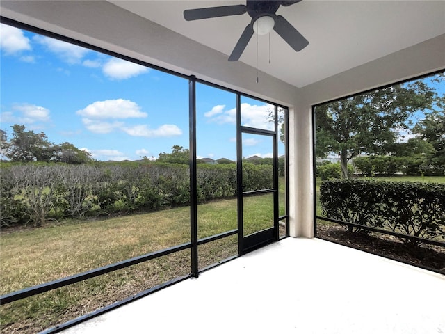 sunroom / solarium with ceiling fan