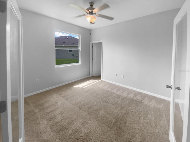 33083 Windelstraw Dr, Wesley Chapel, FL 33545 - unfurnished bedroom featuring carpet, baseboards, and ceiling fan