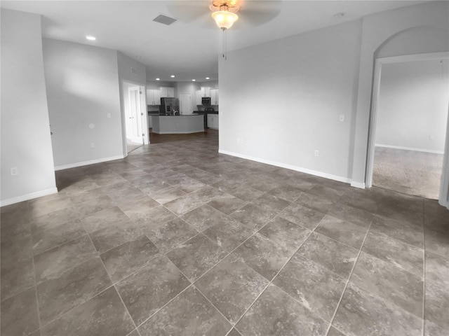33083 Windelstraw Dr, Wesley Chapel, FL 33545 - unfurnished living room featuring ceiling fan and recessed lighting