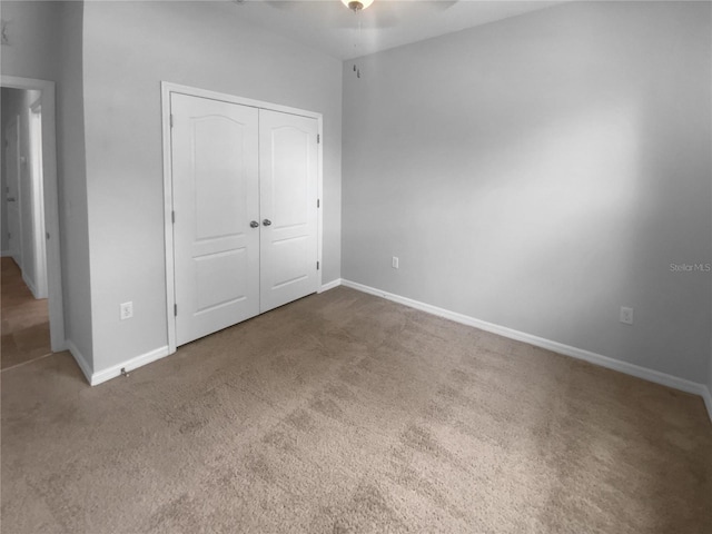 33083 Windelstraw Dr, Wesley Chapel, FL 33545 - unfurnished bedroom with carpet, a closet, and ceiling fan