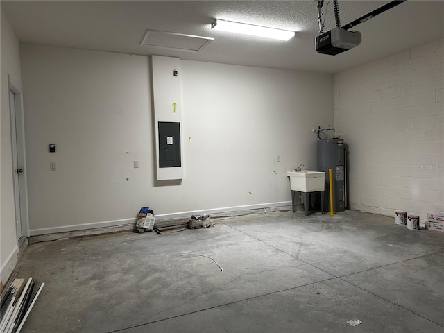 garage featuring a garage door opener, electric panel, sink, and water heater