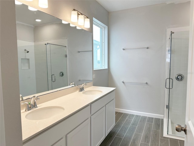 bathroom with vanity and walk in shower