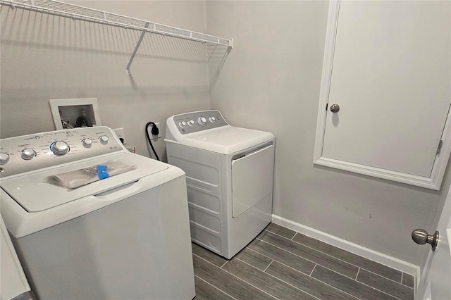 washroom featuring washer and dryer