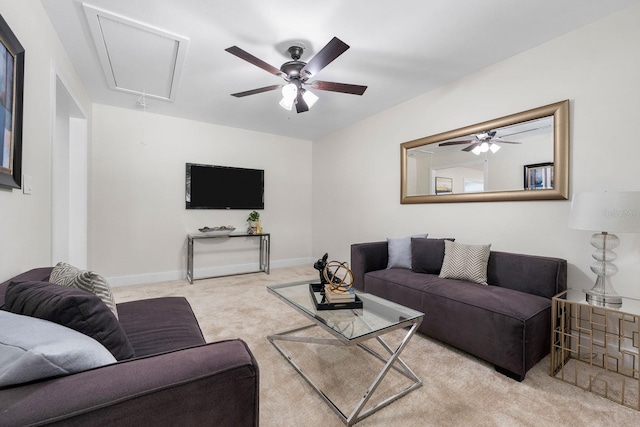 living room with light carpet and ceiling fan